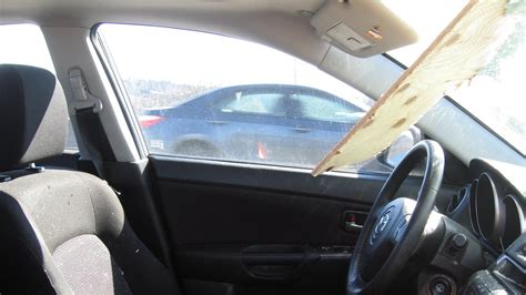 Washington Driver Escapes Death After Plywood Smashes Through