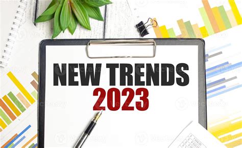 TRENDS 2023 text on paper with charts and pen 17676779 Stock Photo at Vecteezy