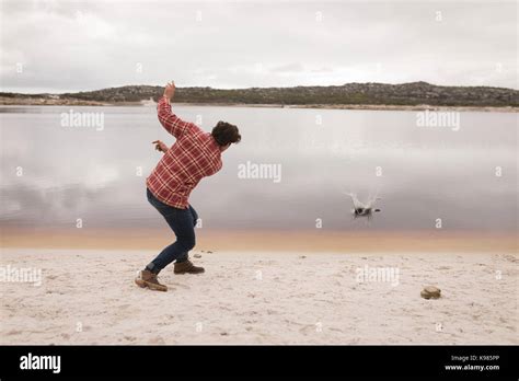 Throwing stone hi-res stock photography and images - Alamy