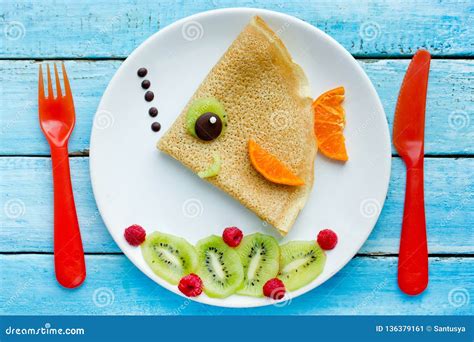 Funny Pancakes With Fruits Shaped Fish For Kids Breakfast Stock Image