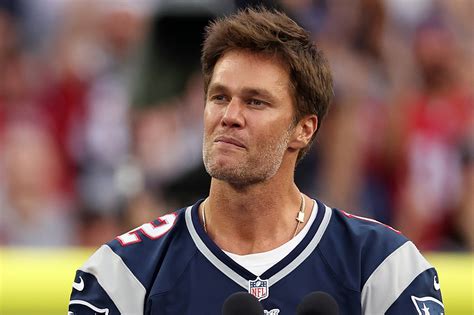 Tom Brady unrecognizable with 'man bun' in Patriots playing days after ...