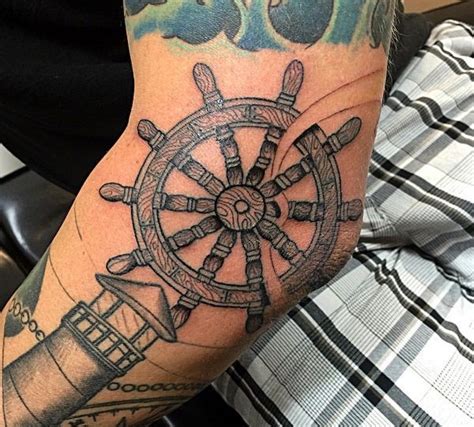 Ship Wheel Tattoos Designs And Meanings Ship Wheel Tattoo Tattoo