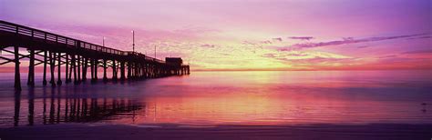 Silhouette Of A Pier At Sunset Newport Photograph By Panoramic Images