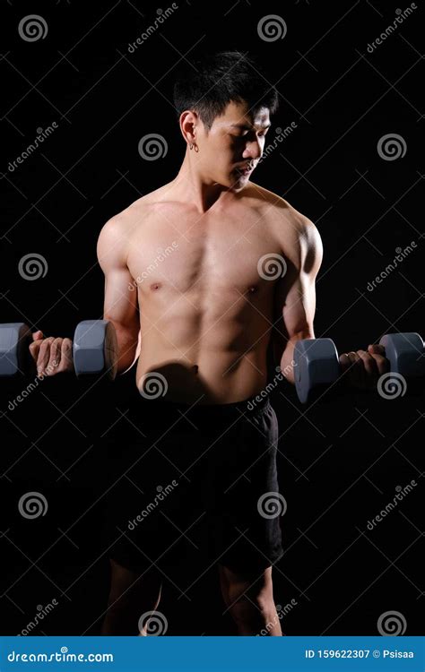 Athletic Muscular Bodybuilder Man With Naked Torso Six Pack Abs Working