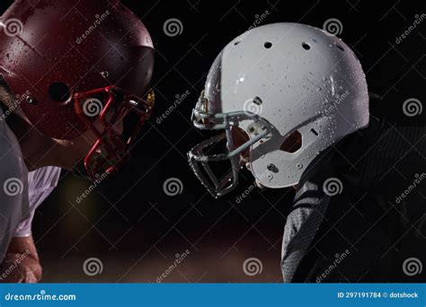 Two American Football Players Face To Face In Silhouette Shadow On