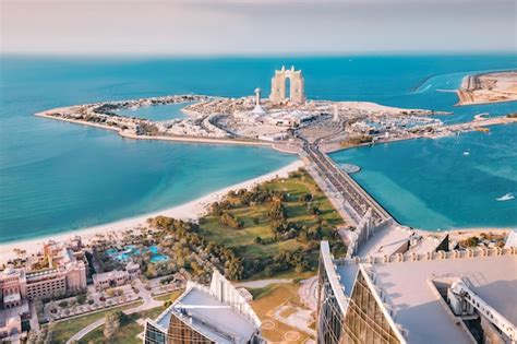 Premium Photo | Aerial view of the skyscrapers of abu dhabi the ...