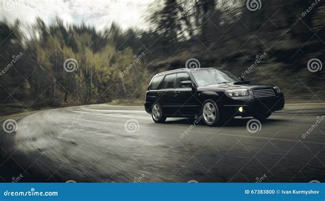 Black Car Fast Drive on Asphalt Road at Daytime Stock Photo - Image of ...