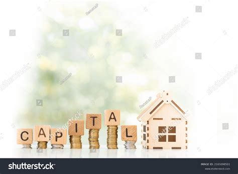 House Stacks Money Rising Curve Symbolizing Stock Photo 2165098501