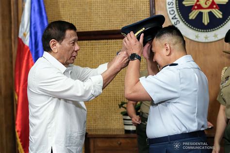 President Rodrigo Roa Duterte Pins The Rank Insignia On Newly Promoted