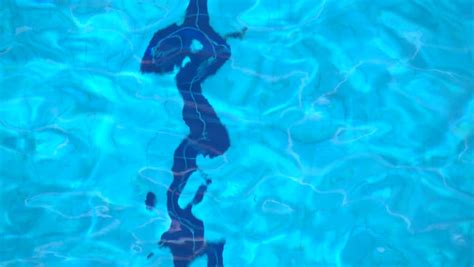 Sexy Blonde In Blue Bikini Diving Into The Swimming Pool On A Sunny Day Stock Footage Video