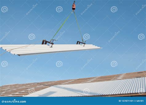 The Process Of Installation Of Sandwich Panels On A Building Site