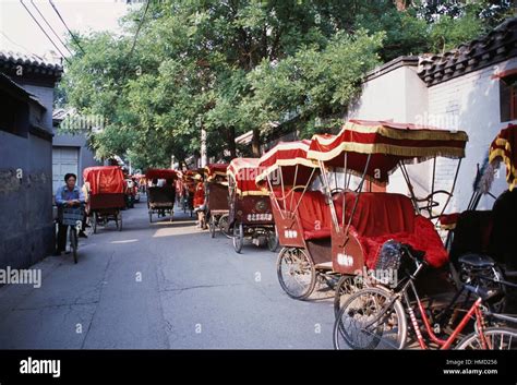 Rickshaw in a street in Beijing, China Stock Photo - Alamy