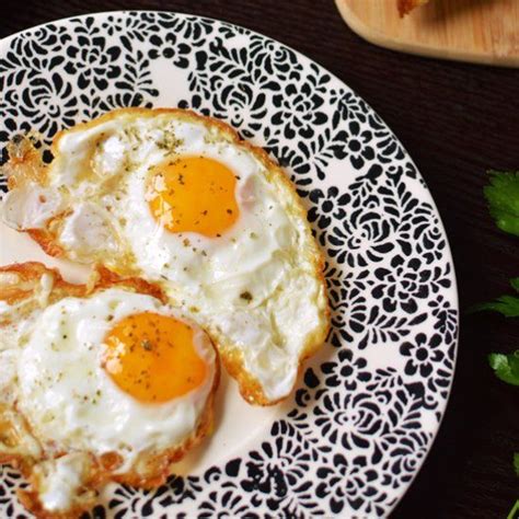 Crispy Fried Eggs Golden Crisp Edges With Runny Yolks Perfect For Dipping Toast For Added