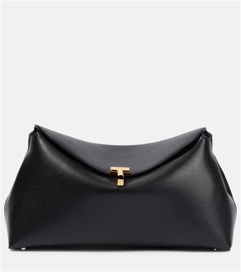 Tot Me T Lock Small Leather Clutch In Black Lyst