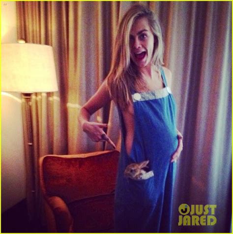 Cara Delevingne Manages To Show Off Fake Baby Bump Side Boob At The Same Time Photo