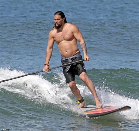 Jason Momoa Exhibits His Toned Chest As He Goes Surfing In Hawaii