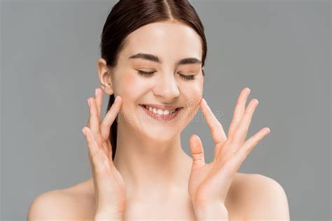 Naked Woman With Closed Eyes Touching Cheeks Isolated On Grey Stock Photo Image Of Pretty