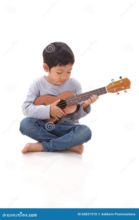 Little Boy Playing The Ukulele Stock Photo Image Of Face Education