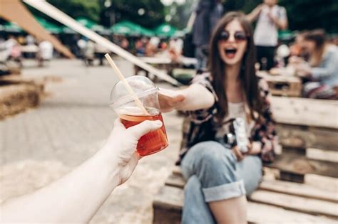 Premium Photo Strawberry Lemonade In Hand Stylish Hipster Woman In