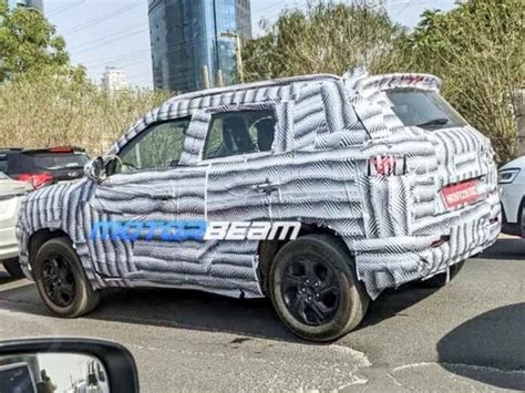 2022 Maruti Brezza Spied With New Camo Cng Brezza