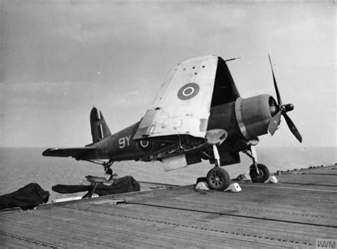 Asisbiz Fleet Air Arm Corsair Mkii Y On A Outrigger Hms Khedive East