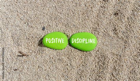 Positive discipline symbol. Concept words Positive discipline on beautiful green stone ...