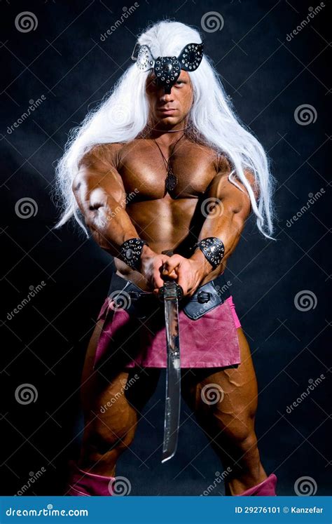 Naked Warrior Carrying Steel Sword Painted Face Stock Image