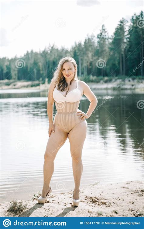 Plus Size Woman With Curvy Figure In Corset Lingerie Caucasian Xxl Chubby Girl Wanna Swimming