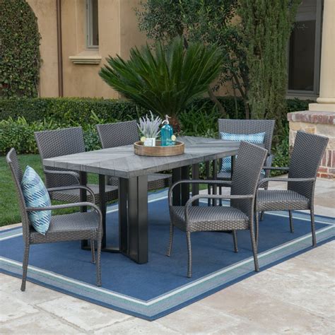 Fabiana Outdoor 7 Piece Wicker Dining Set With Textured Finish Light