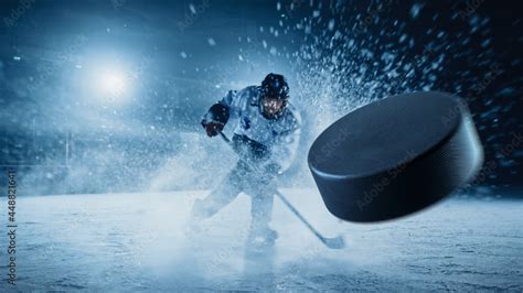 Ice Hockey Rink Arena Professional Player Shooting The Puck With