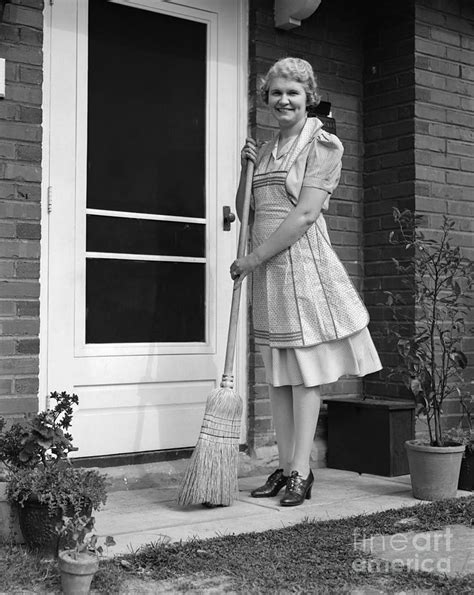 Woman Smiling With Broom C 1940s Photograph By H Armstrong Roberts Classicstock