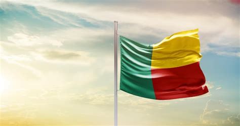 Premium Photo Benin National Flag Waving In Beautiful Sky