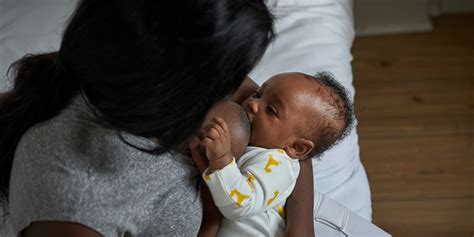 newborn baby  mother breastfeeding
