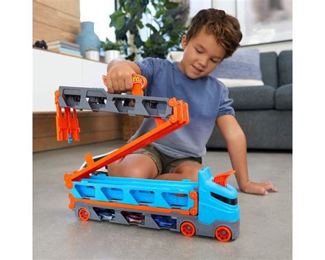 2in1 Camion Trasportatore E Pista Con 3 Macchinine Hot Wheels GVG37