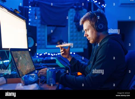Gamer drinking an energy drink, gaming lifestyle Stock Photo - Alamy