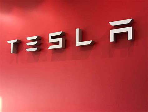 tesla-logo-red-sign - TESLARATI