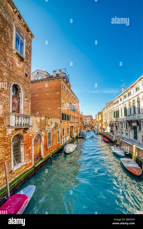 water flowing in typical canal in Venice Stock Photo - Alamy