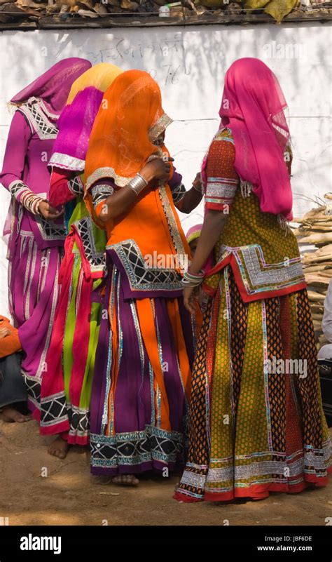 Tribal Dancers In Colorful Costumes Performing In Their Community In