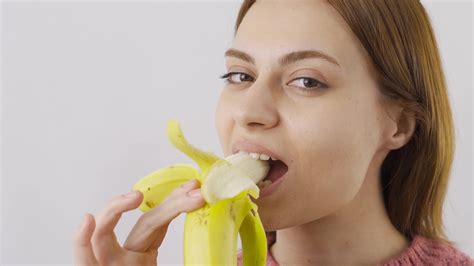 Woman Eating Fruit