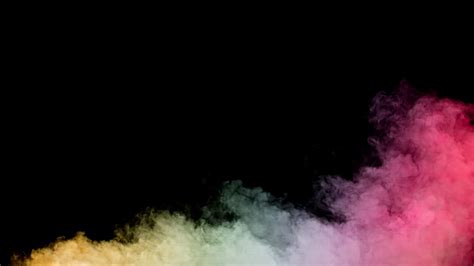 Colored smoke on black background - Free Stock Video