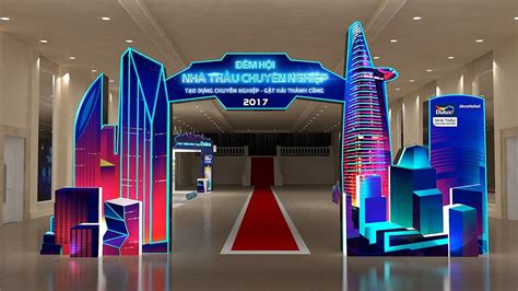 An Entrance To A Convention Hall With Red Carpet And Blue Neon Lights