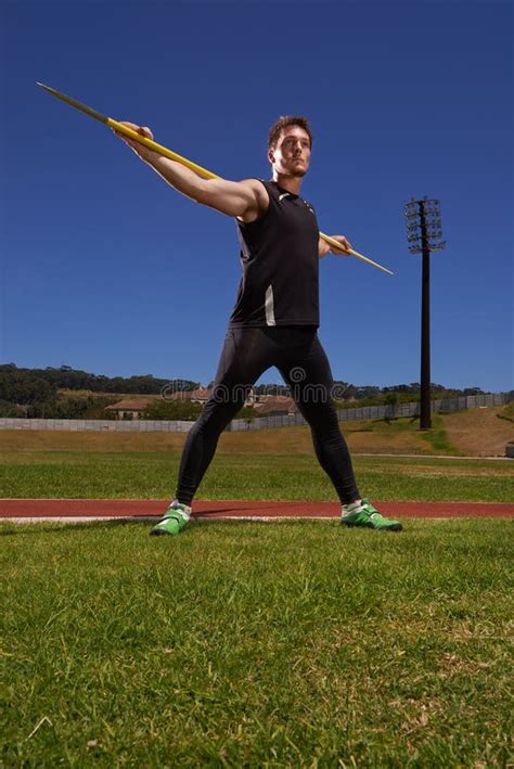 Man Athlete And Javelin Or Sport Exercise For Competition On Grass For