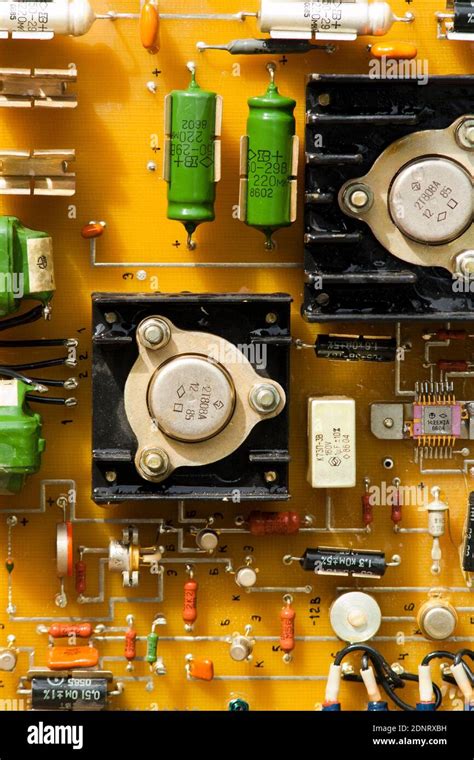 Radio parts on the electronic board. Old USSR radio components on ...