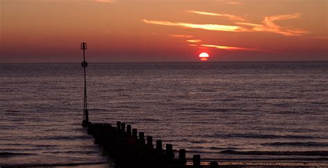 Hunstanton Sunset Over The Wash The Sun Sets Over Sunny Hu Flickr