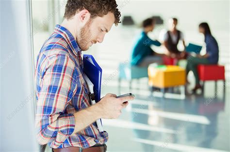 Businessman Checking Cell Phone Stock Image F014 5666 Science