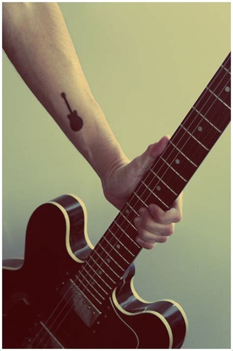 25 Creative Guitar Tattoo Designs