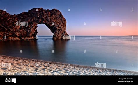 Durdle Door at Sunset Stock Photo - Alamy