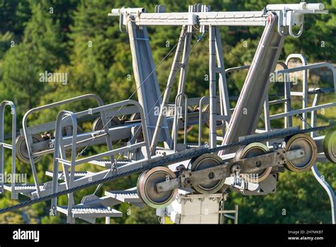 Roller ski lift cable system. Ropeway or cableway or Cable car in mountains Stock Photo - Alamy