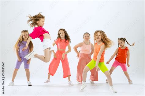 Portrait of happy, active little girls, happy kids in bright colorful ...