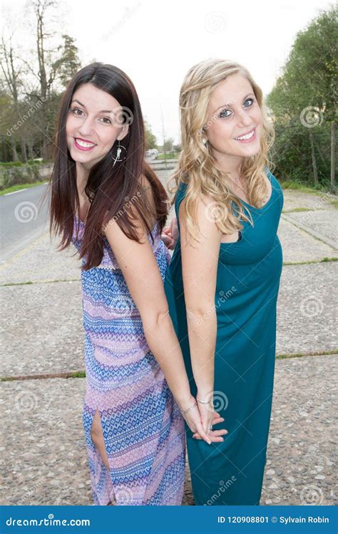 Friends Brunette And Blonde Holding Each Other Stock Image Image Of